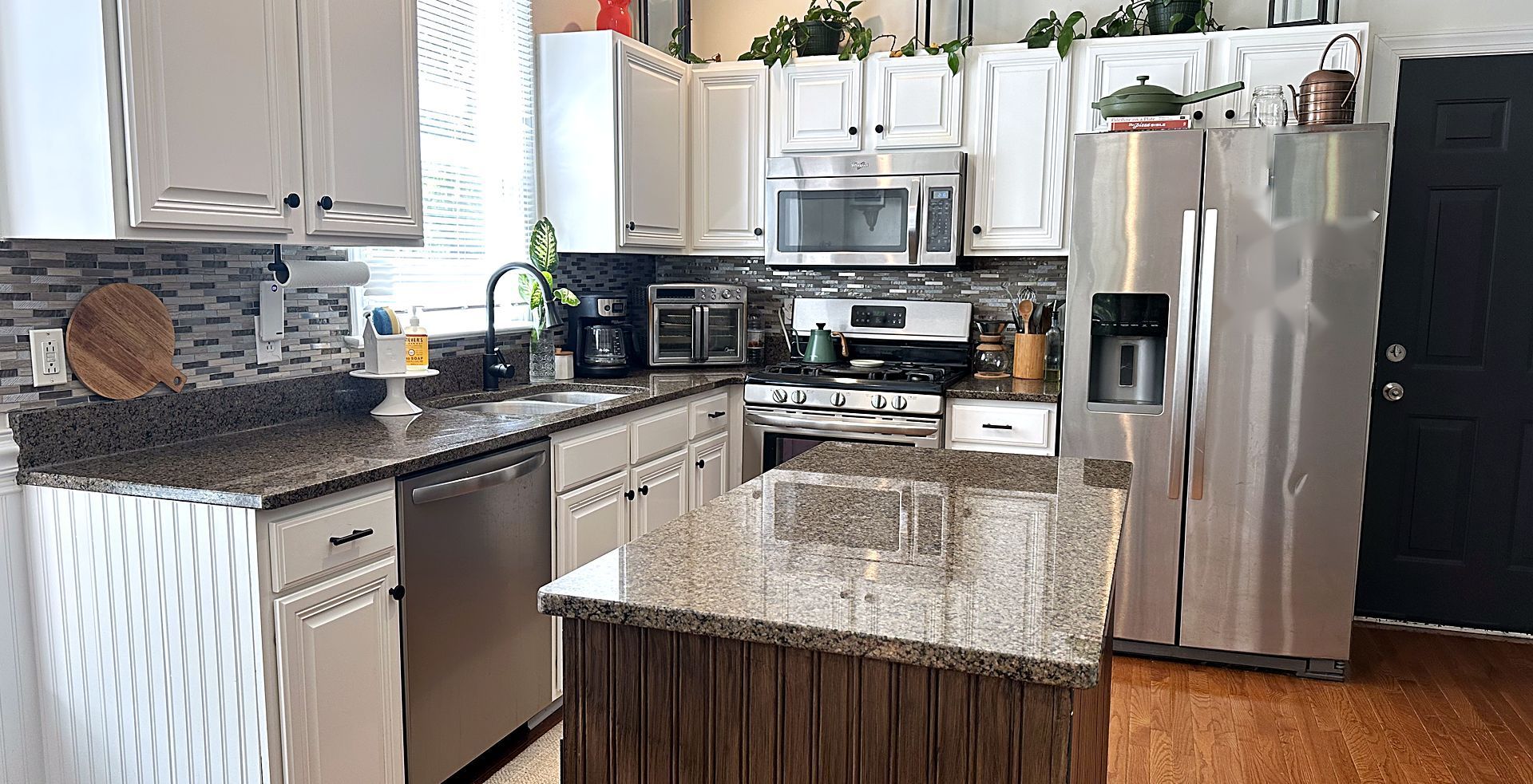 A spotless, freshly cleaned kitchen in a Wake Forest home